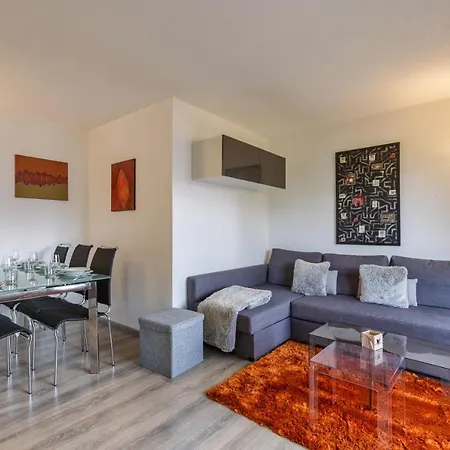 Stylish condo w/ parking, terrace, garden access.